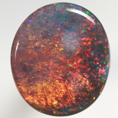 SOLID BLACK OPAL Burning golden fire, very bright! SEE VIDEO